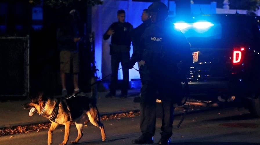 Two Boston cops in critical condition after shootout