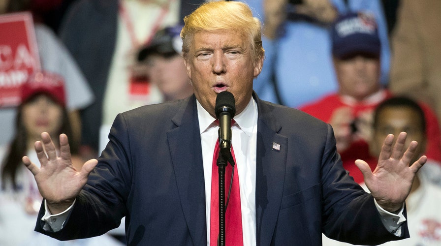 Trump mocks NFL concussion rules at Florida rally