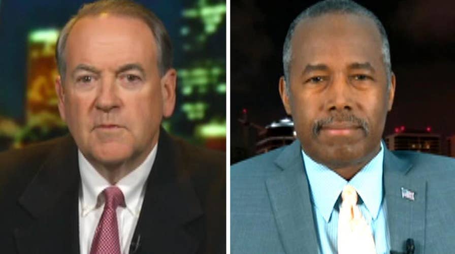 Huckabee and Carson call for talk of issues, not accusations