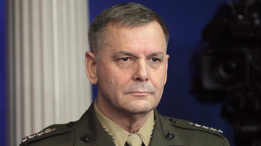 Retired general charged for making false statements