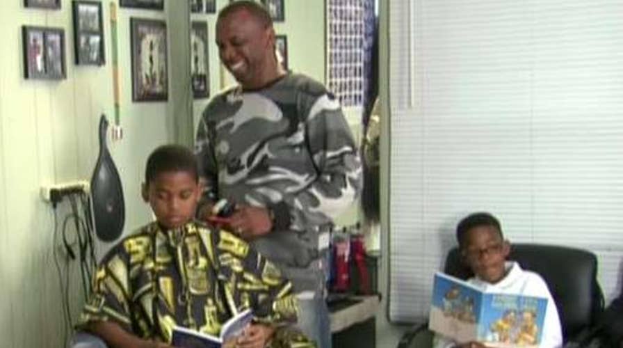 Barbershop discounts haircuts for kids who read aloud