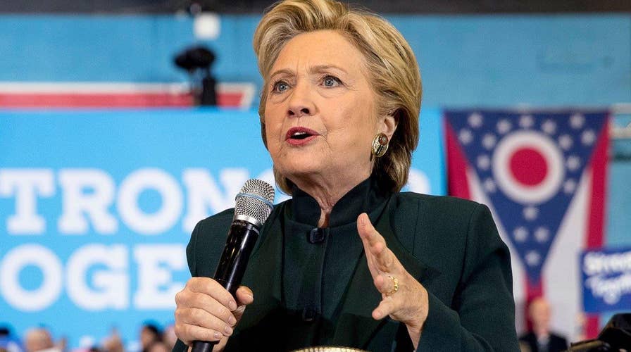 Hillary Clinton works to tie Donald Trump to Putin's Russia