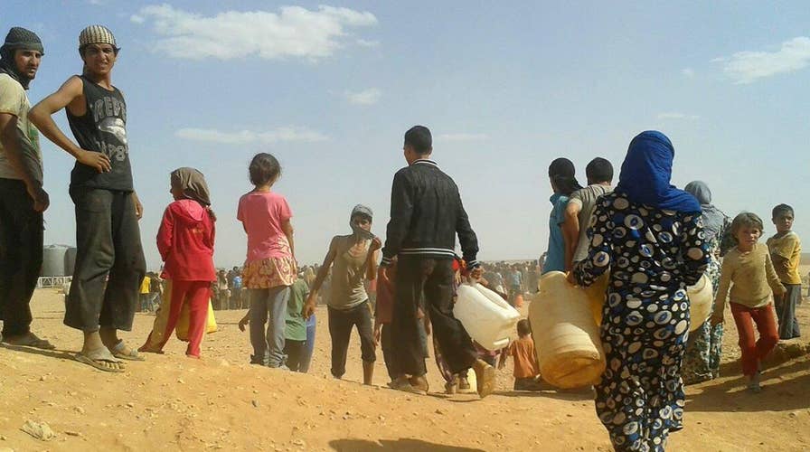 Michigan town votes to ban Syrian refugees