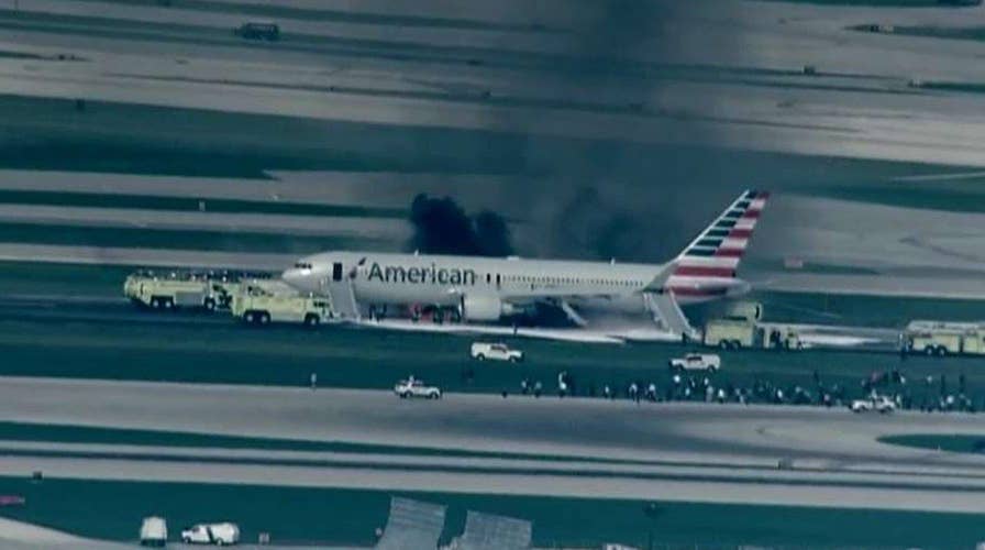 Jet blows tire, aborts takeoff, catches fire in Chicago