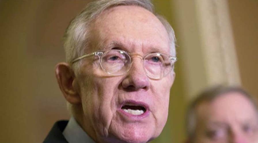 Senator Reid accuses Comey of trying to influence election