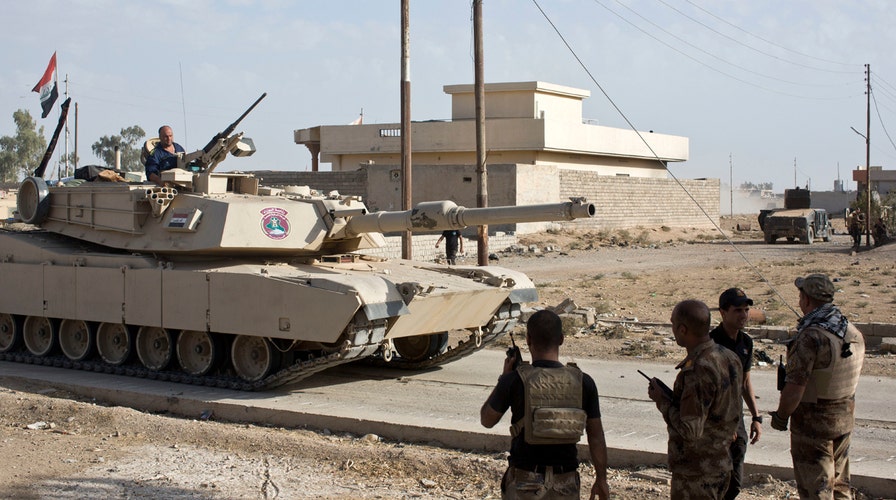 Iraqi forces break through enemy lines in Mosul