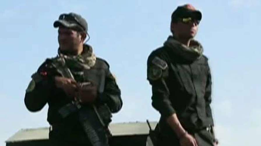 Iraqi forces search Mosul homes for explosives