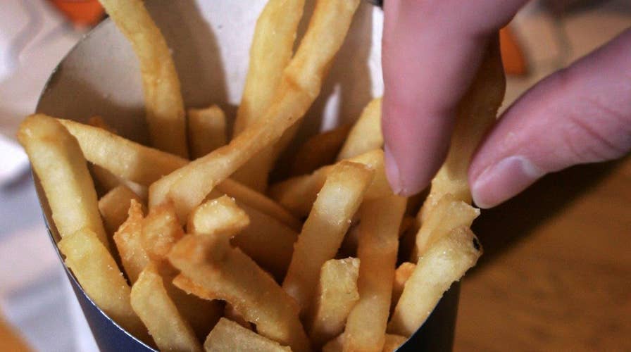 Which fast food chain gives the most, least fries per order?