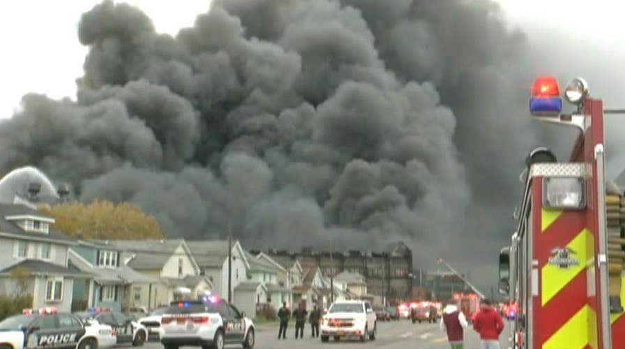 Hot light bulb sparks massive steel mill fire