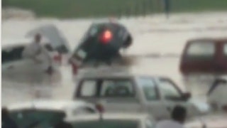 Powerful flood waters twirl vehicle around with ease - Fox News