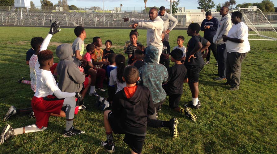 Police bridge gap with community using football program