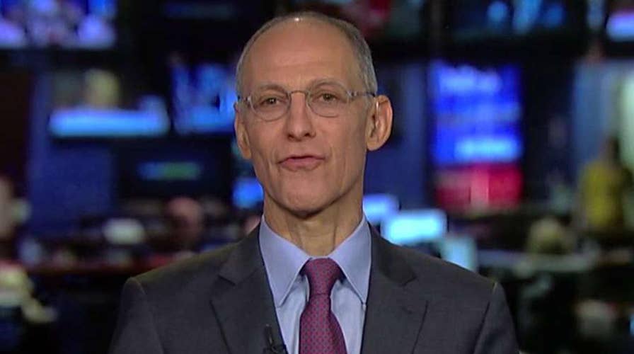 ObamaCare architect defends mandate and premium costs