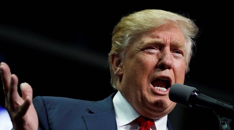 Trump defies convention, blasts transition critics