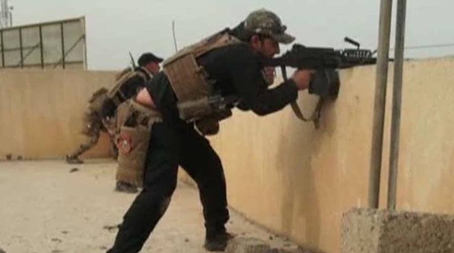 Iraqi special forces pause in Mosul due to bad weather
