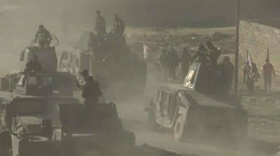 Iraqi forces advance through intense fighting in Mosul 