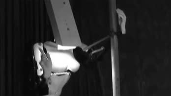 Where do you put the money? Robot stripper performs at Australian 'Sexpo'