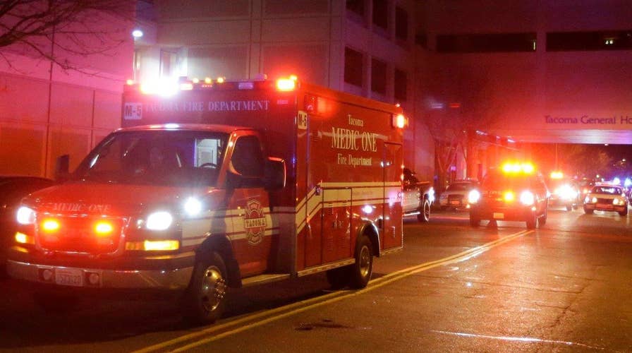 Gunman who killed officer, kidnapped kids shot by police