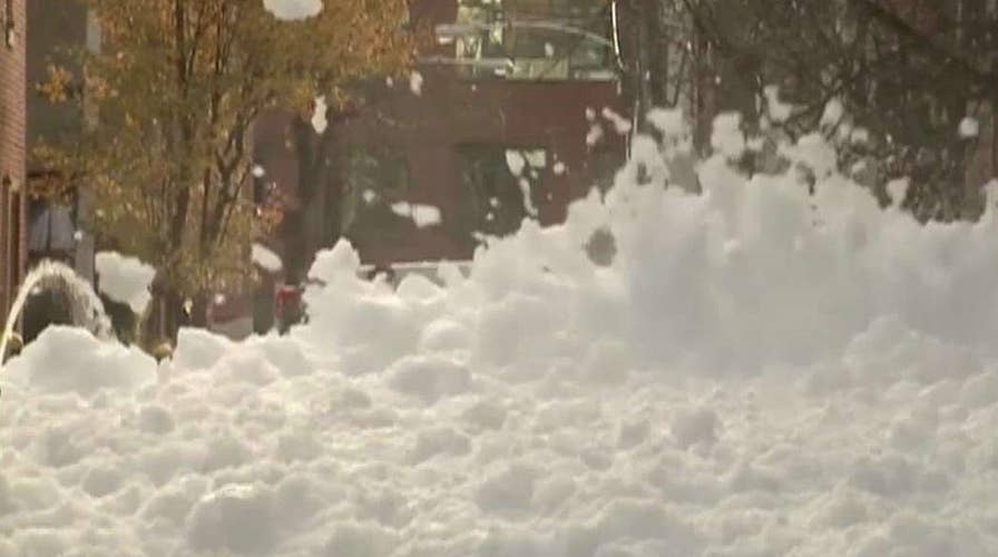 Foam floods the streets of Philadelphia