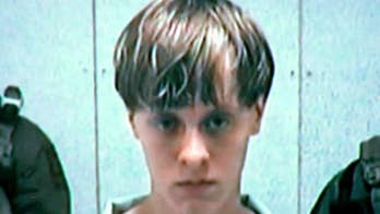 Dylann Roof allowed to hire lawyers back, for now