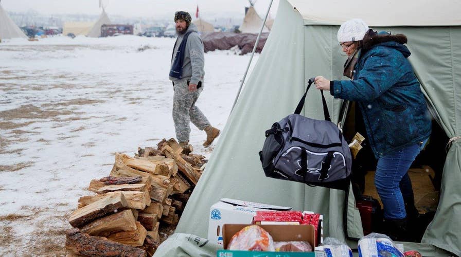 Blizzard conditions dampen protests in North Dakota