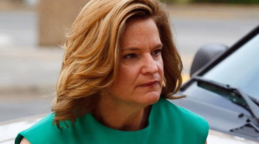 Top Clinton aide ramps up criticism of Trump campaign