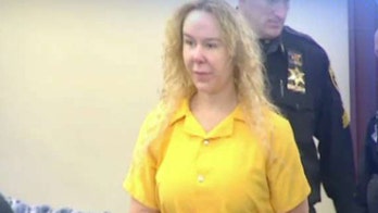 Woman charged in twin's death in Hawaii OKs extradition