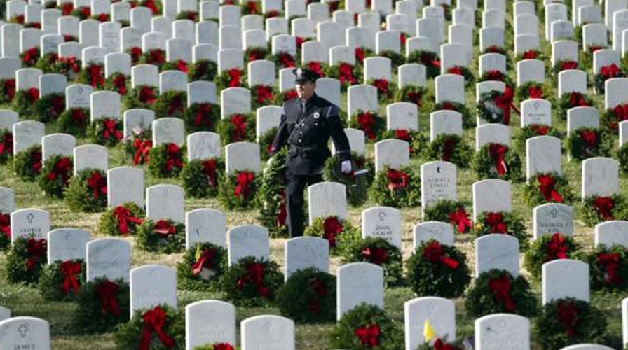 Wreaths Across America places wreaths on Arlington
