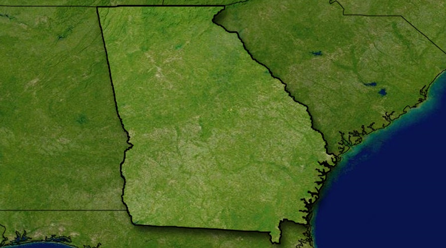 Two Georgia police officers shot in the line of duty