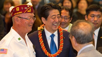 Japan's Abe offers 'everlasting condolences' at Pearl Harbor