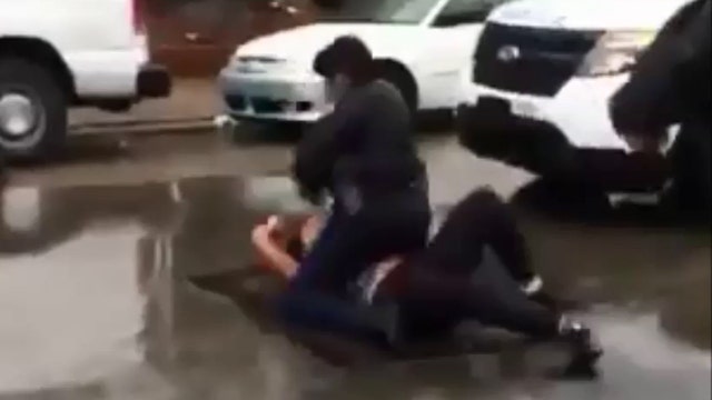 Cop beats teen while attempting to break up brawl
