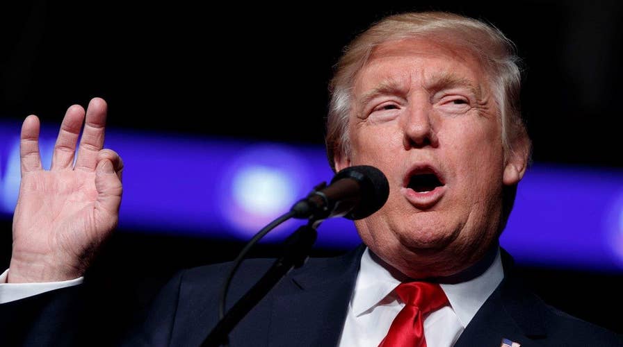 Should Trump restructure government spy agencies?