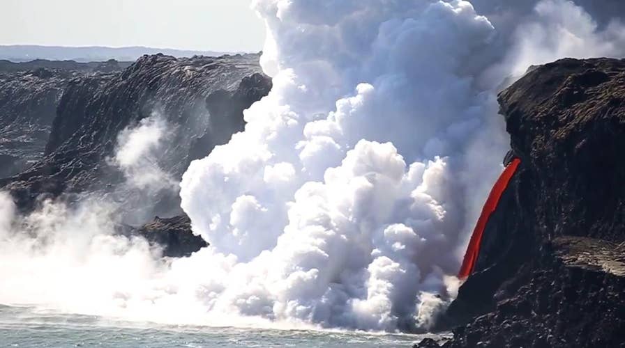 'Fire hose' of lava pours into ocean