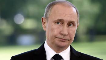 Intel report says Putin ordered campaign to influence US election