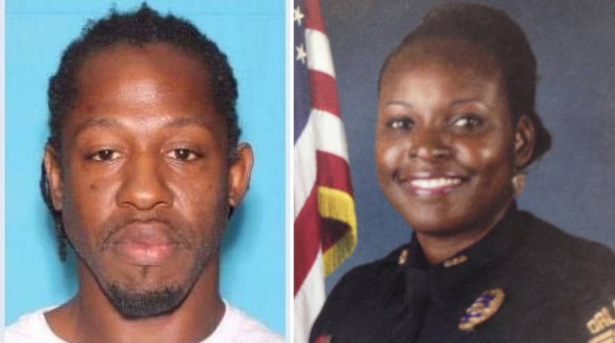 Massive manhunt for suspect in shooting death of Florida cop