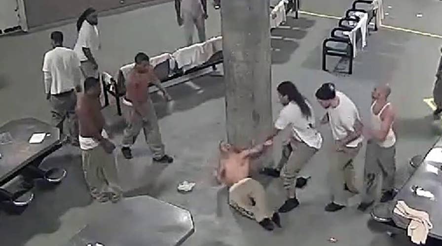 Warning, graphic video: Violent prison brawl caught on tape