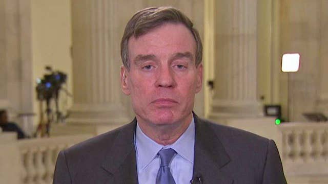 Warner: Russian hack was attack on US democratic process
