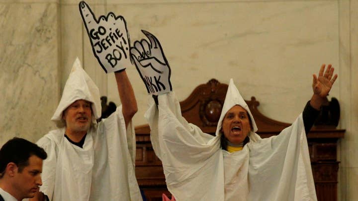 Men in KKK costumes interrupt Sessions confirmation hearing
