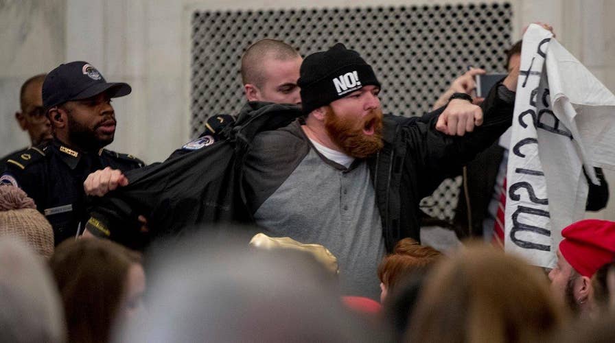 Protests interrupt Sen. Sessions at confirmation hearing