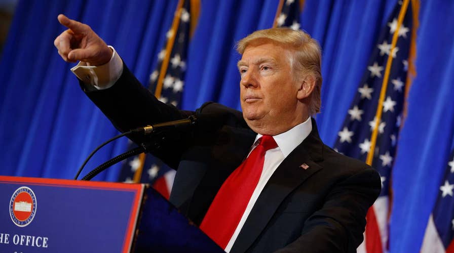 Trump puts his spin on 'fake news' brand