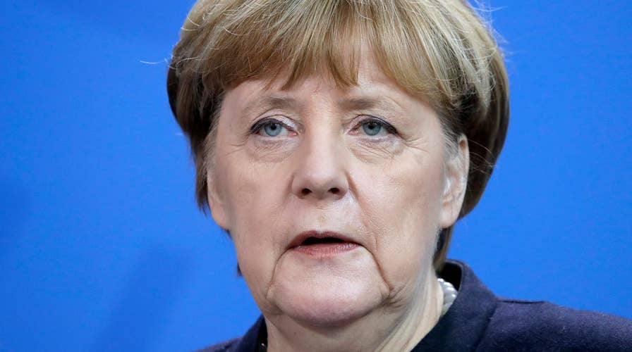 Trump says Merkel made 'catastrophic mistake' on refugees