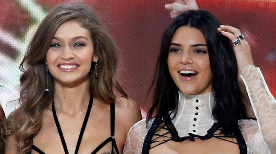 Models harassed by fan with Palestinian flag