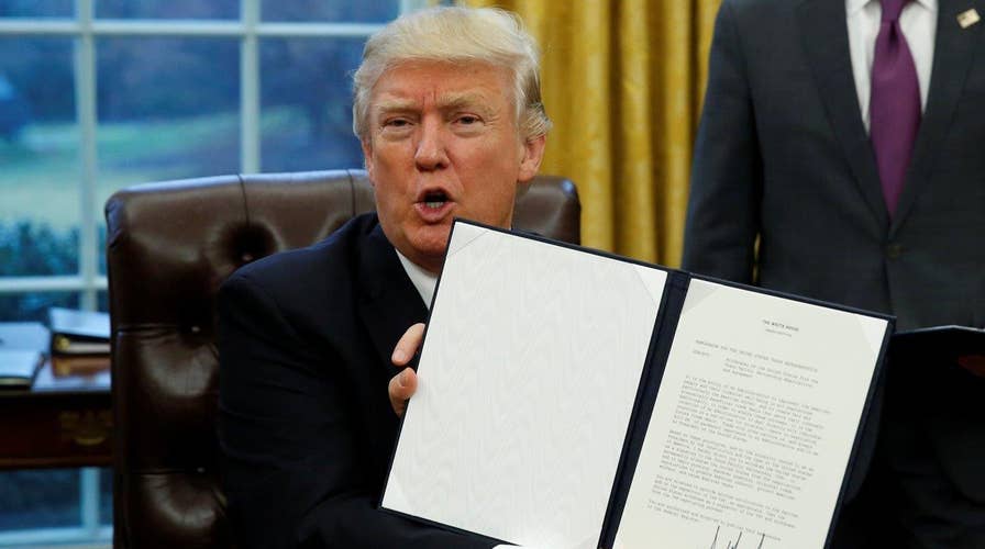 President Trump signs executive orders on first day