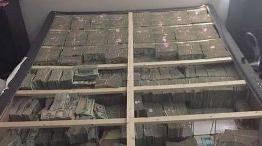 Feds seize $20 million hidden in bed