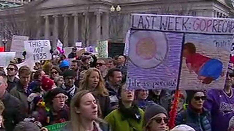 Protest grows outside White House over refugee ban