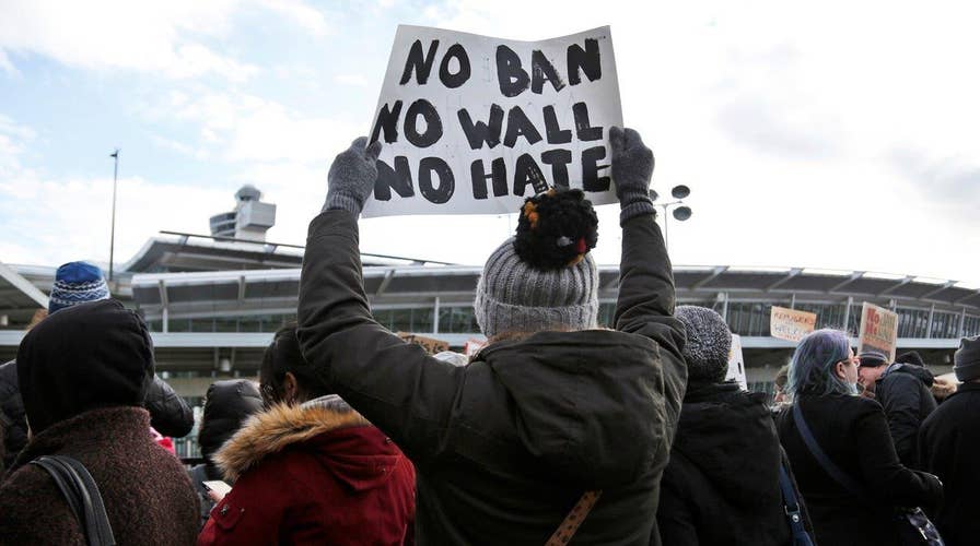 At least 48 detained at JFK under Pres. Trump's travel ban