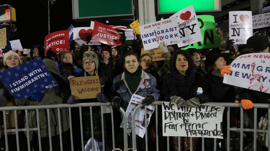 Passengers still detained at JFK airport