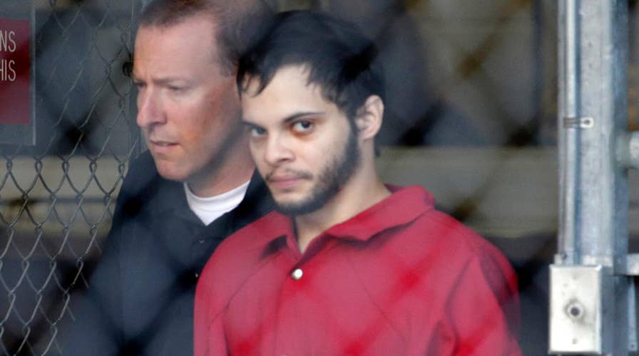 Airport massacre suspect to appear in federal court