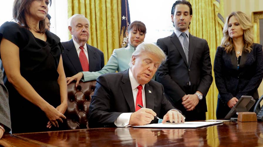 President Trump signs exec. order to cut regulations