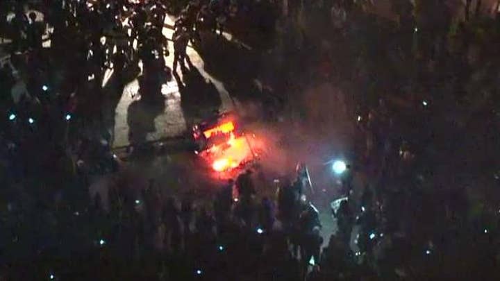 Protesters start fire over Breitbart editor speech