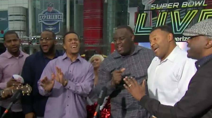 NFL Players Choir performs 'Lovely Day'